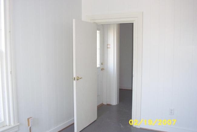 3016-A - Looking from the front room to the Common Area with Restrooms